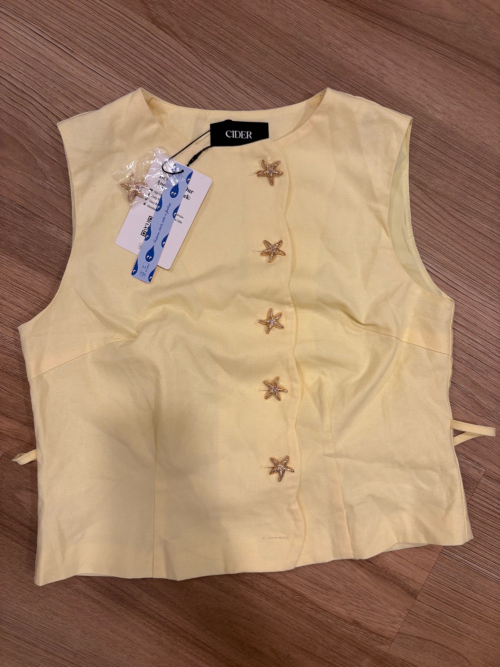 Cider Pale Yellow Sleeveless Top with Star Buttons